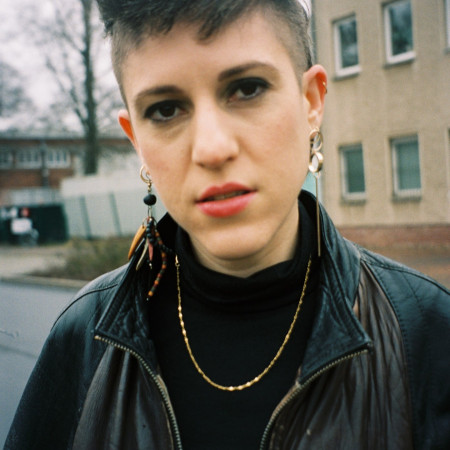 ANDI A.